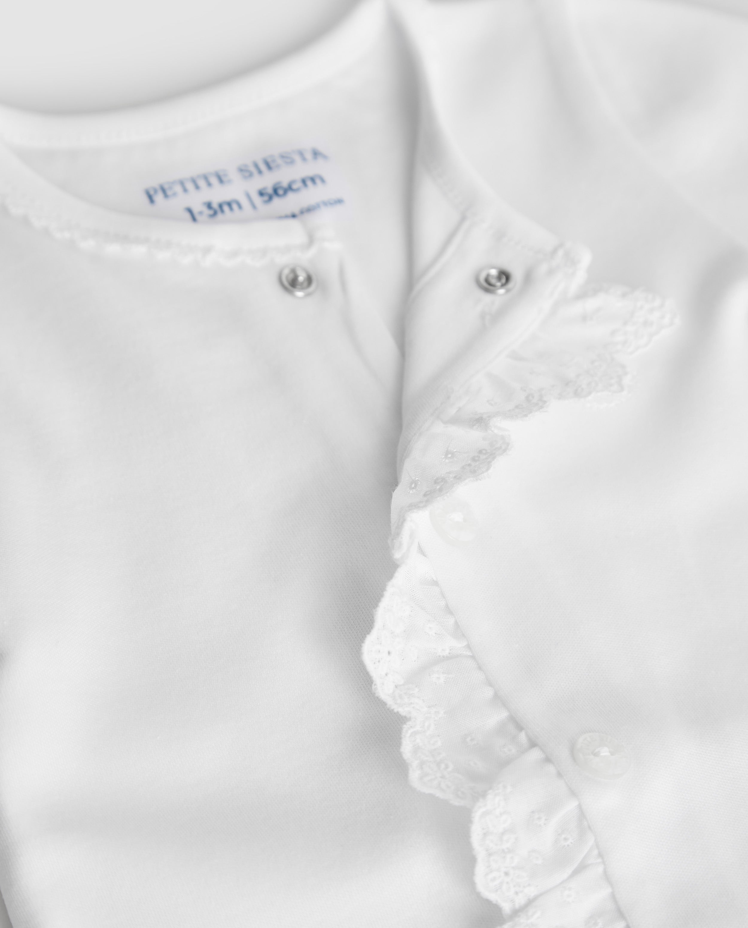 Pyjama bébé à rayures blanches brodées