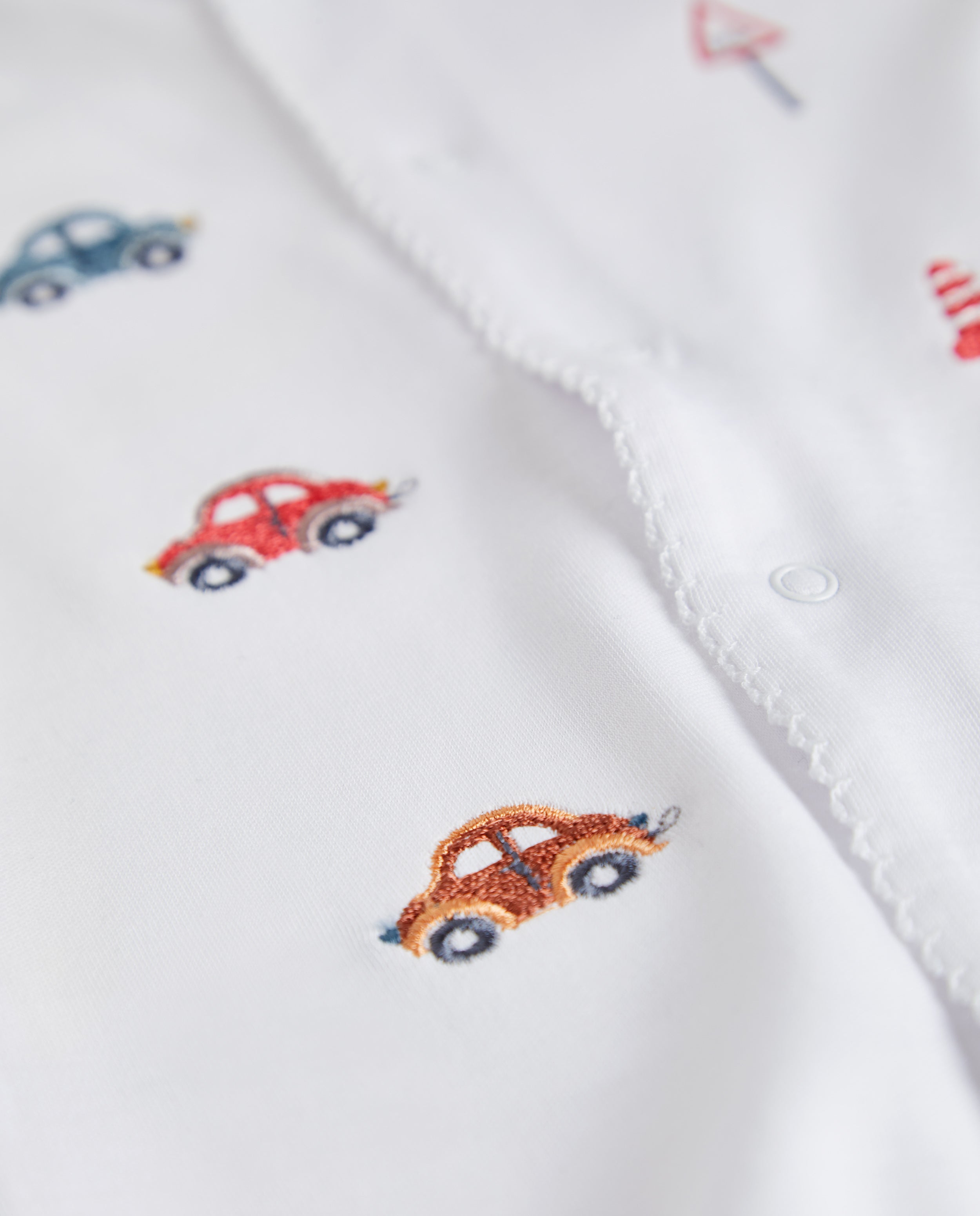 White Baby Pajamas Signs