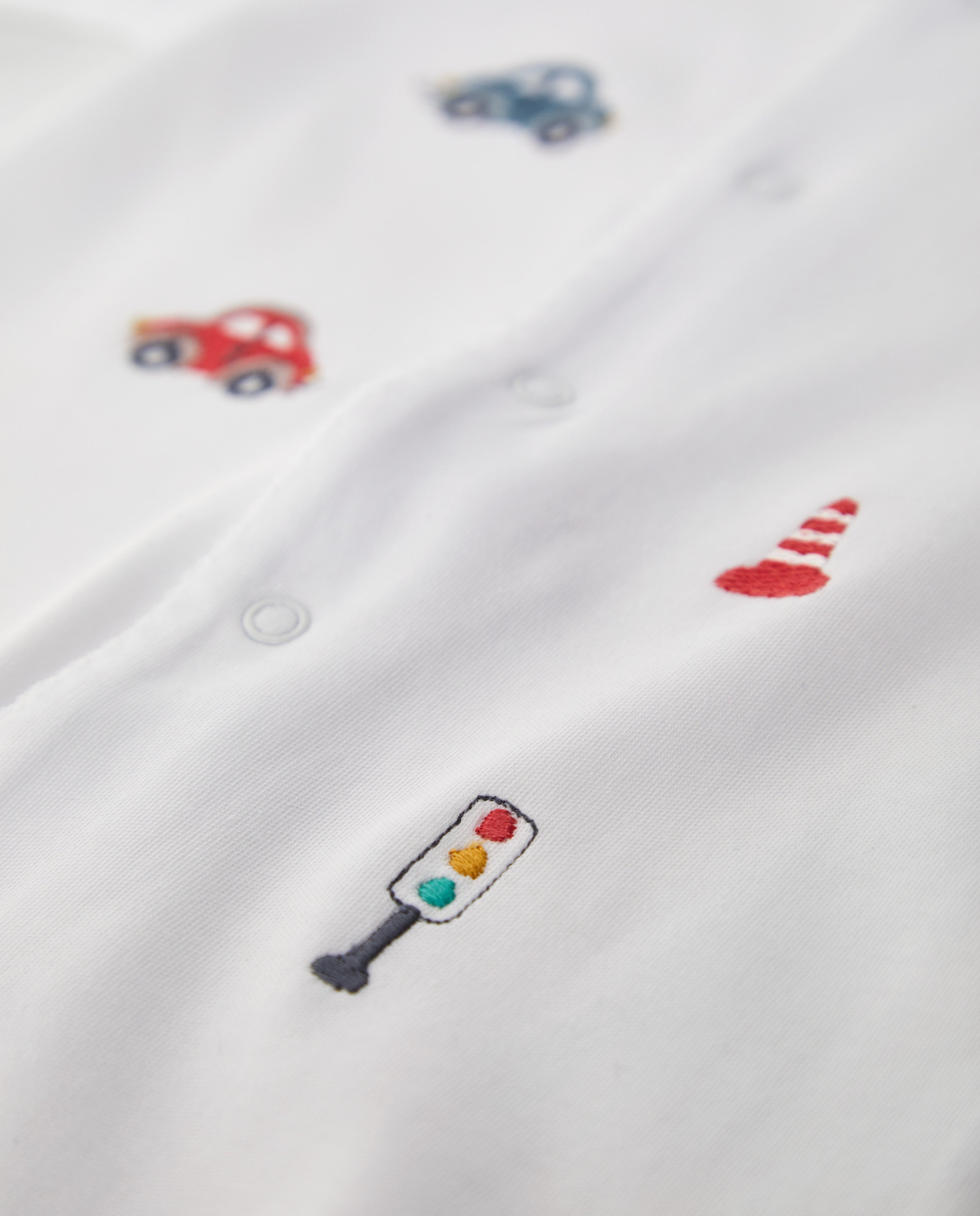 White Baby Pajamas Signs