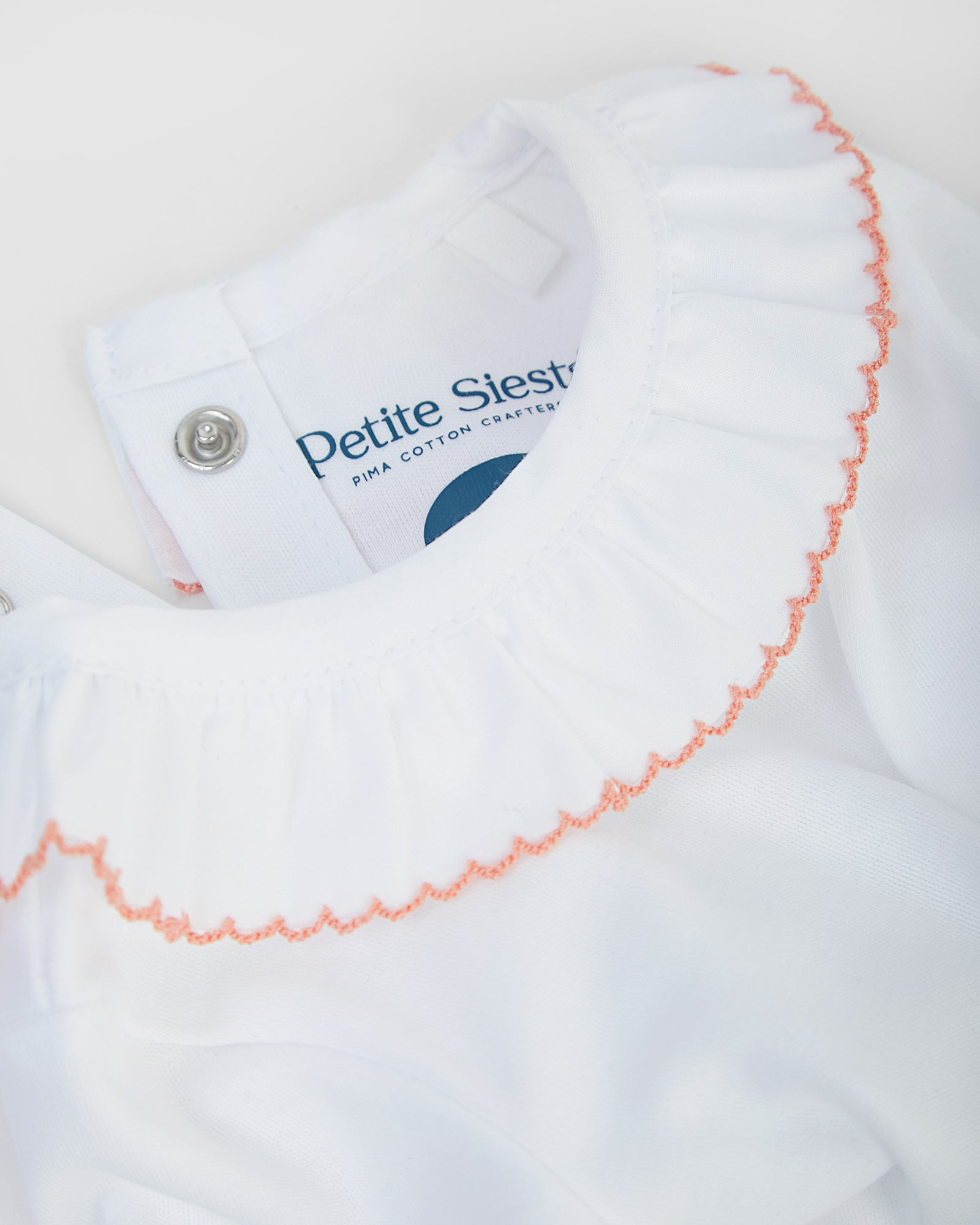 Coral Pink Ruffle Neck Bodysuit